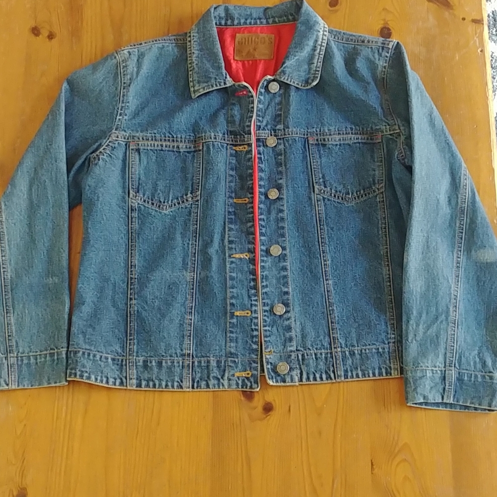 Jean jacket with American Flag decal on the back